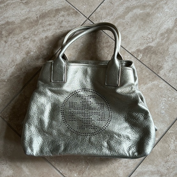 Tory Burch Perforated Logo Champagne Metallic Purse - Picture 1 of 5